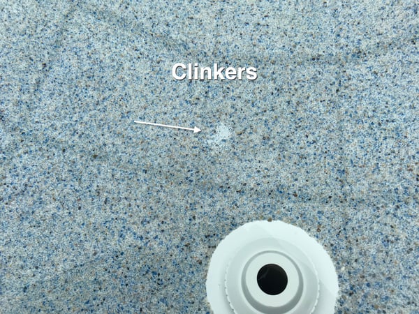 clinker in plaster, pool clinker, cement clinker, clinker, pool plaster, calcium spot in pool