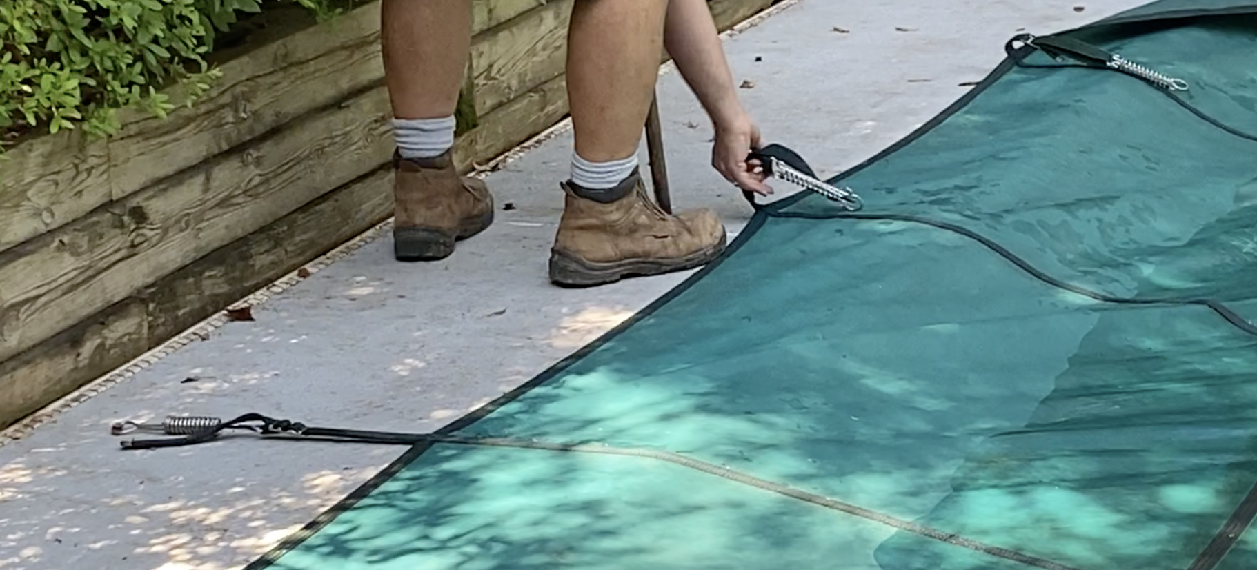 installing a pool safety cover, solid pool cover